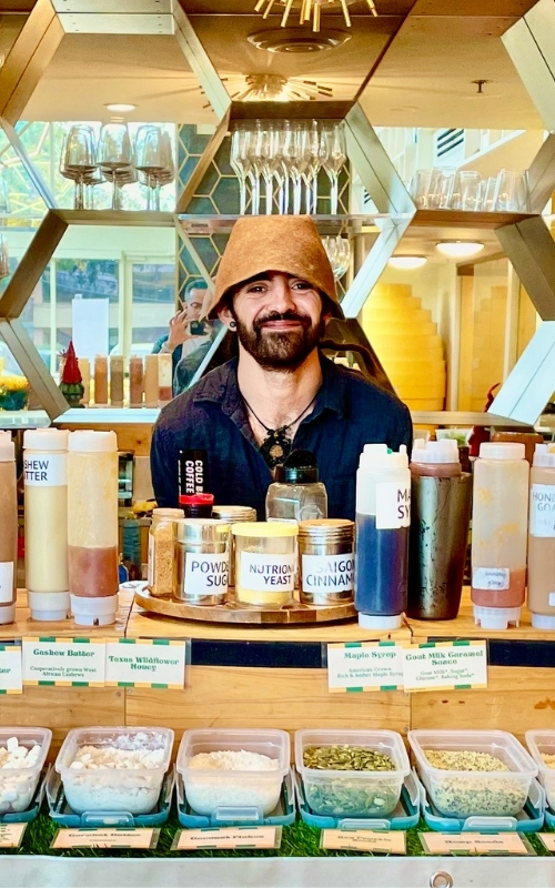 Miguel, founder of The Enchanted Waffle, welcoming guests at his experience bar